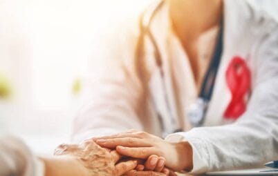 Patient being comforted by a medical professional.